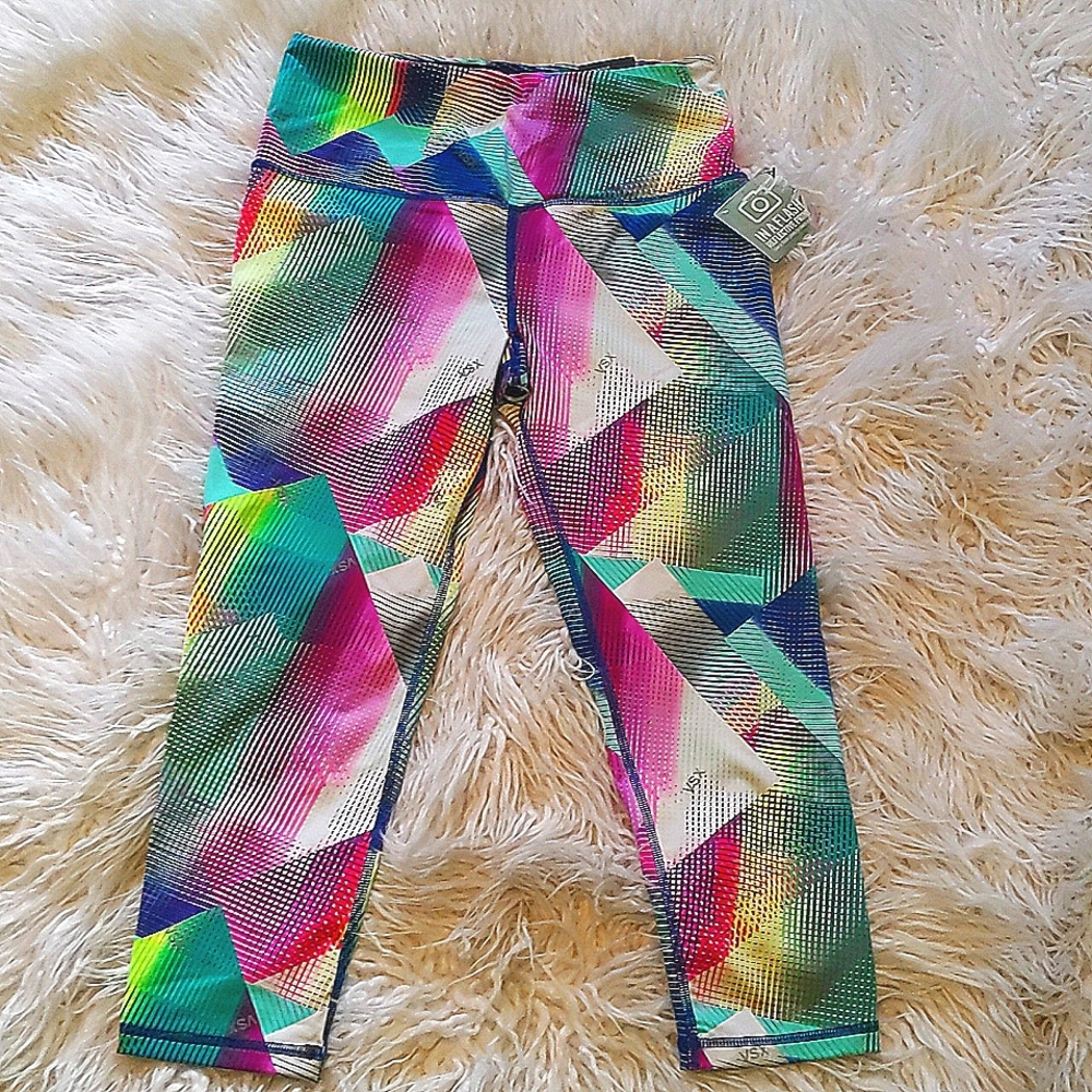 Vic Secret Sport reflective print capris. Never worn has tags.